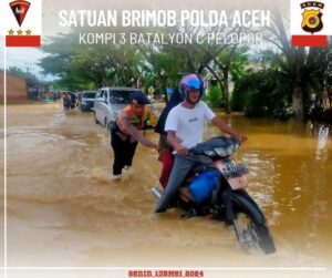 Banjir Lumpuhkan Akses Transportasi, Brimob Turun Ke Lokasi di Nagan Raya.