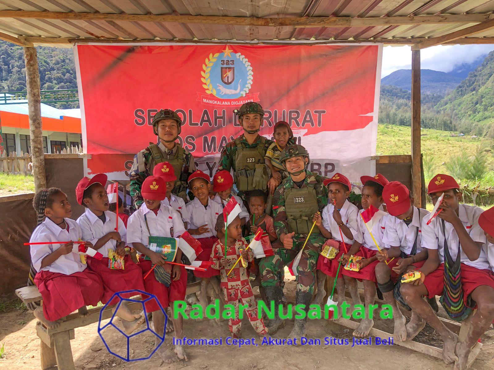 Peringatan Hari Anak Nasional Satgas Yonif 323 Buaya Putih