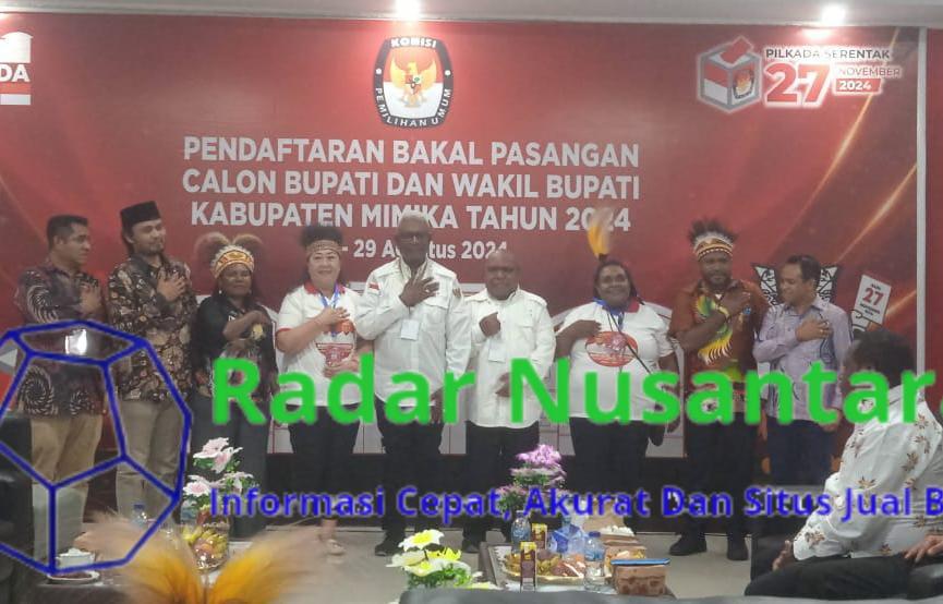 Tagline Pasangan Joel Johannes Rettob - Emmanuel Kemong : Bangkit, Bergerak, Menang Membawa Mimika Pada Kemajuan Pembangunan