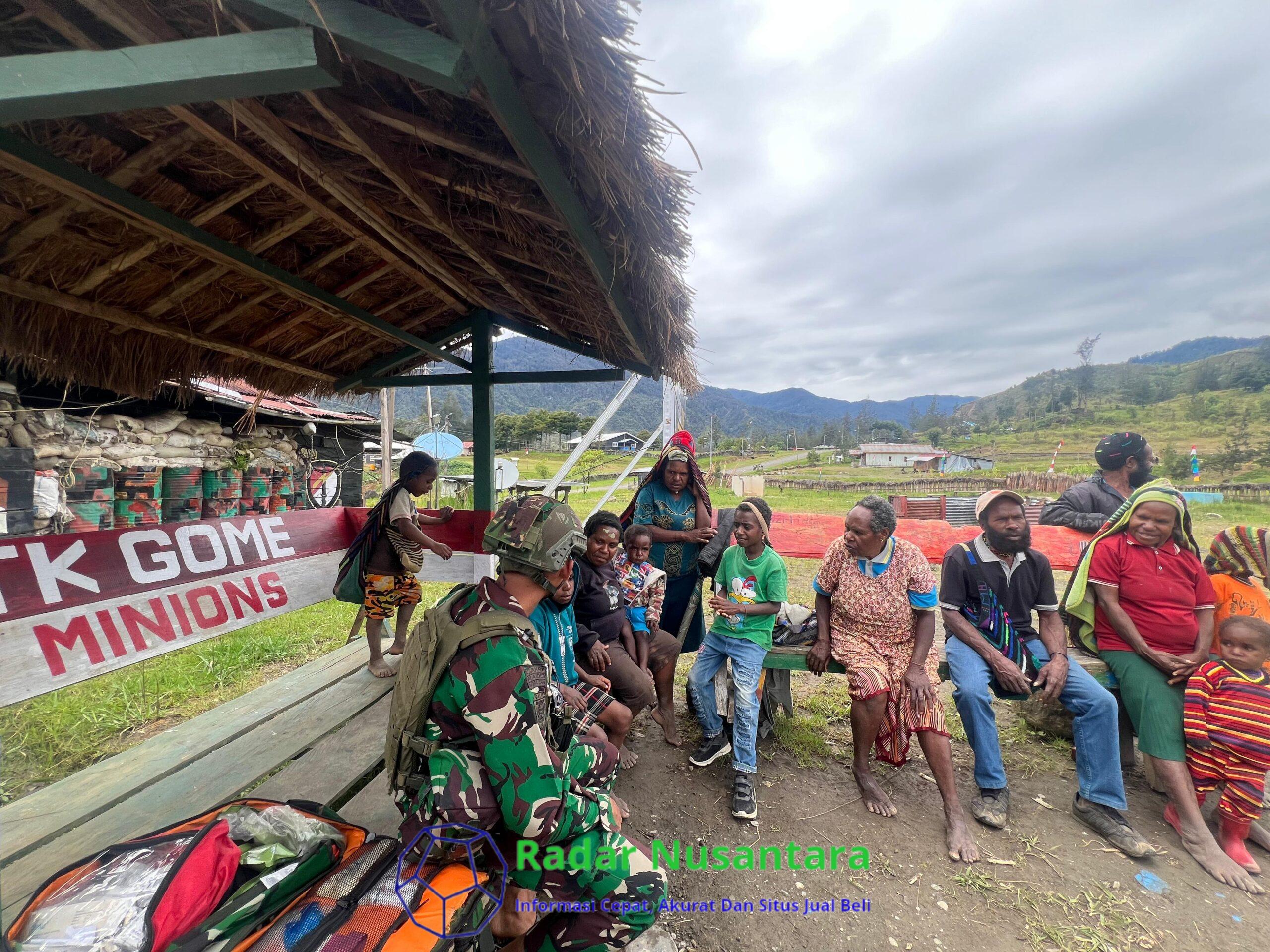 Satgas Yonif 323 Melayani Masyarakat Yang Sakit di Titik Kuat Gome