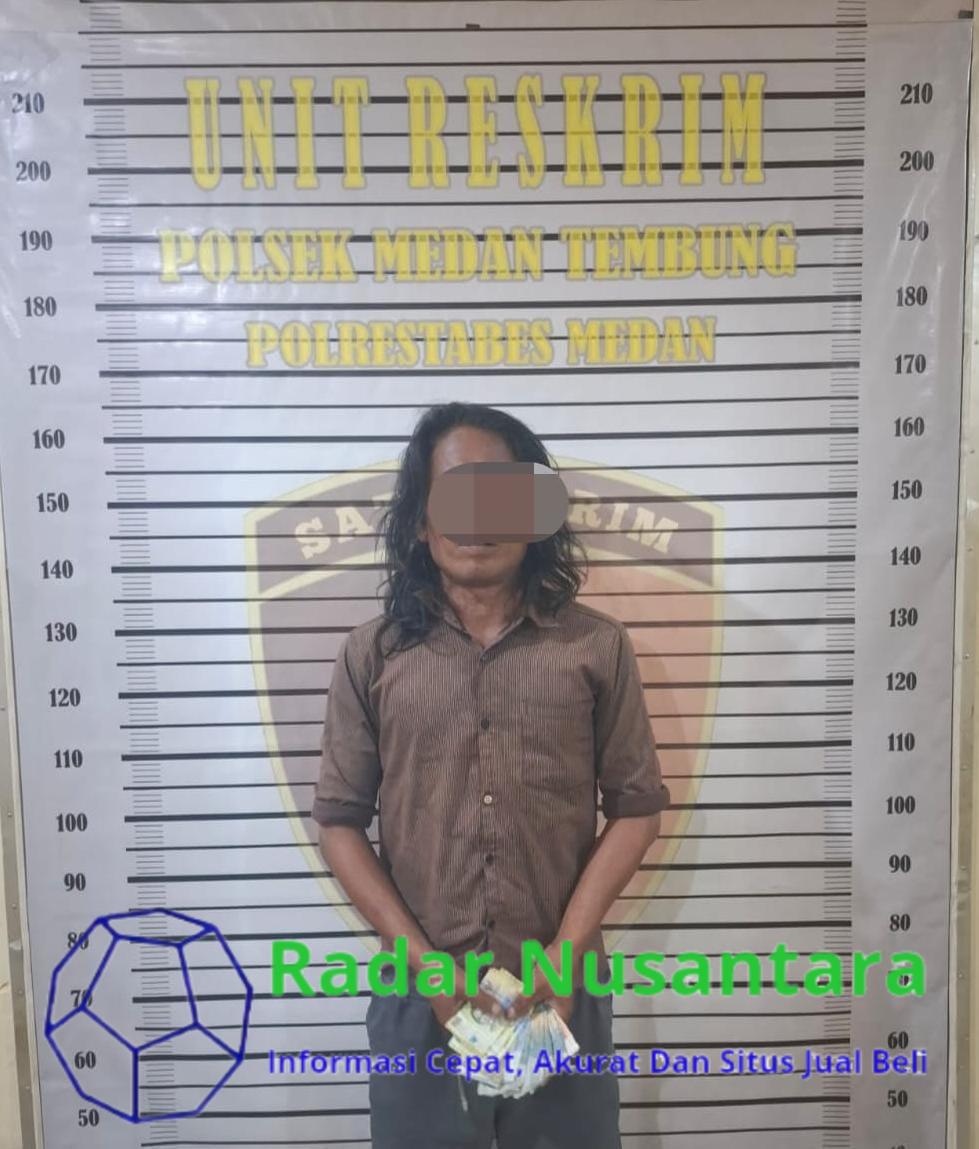 Foto : Pelaku Natanael saat di amankan di Polsek Medan Tembung.