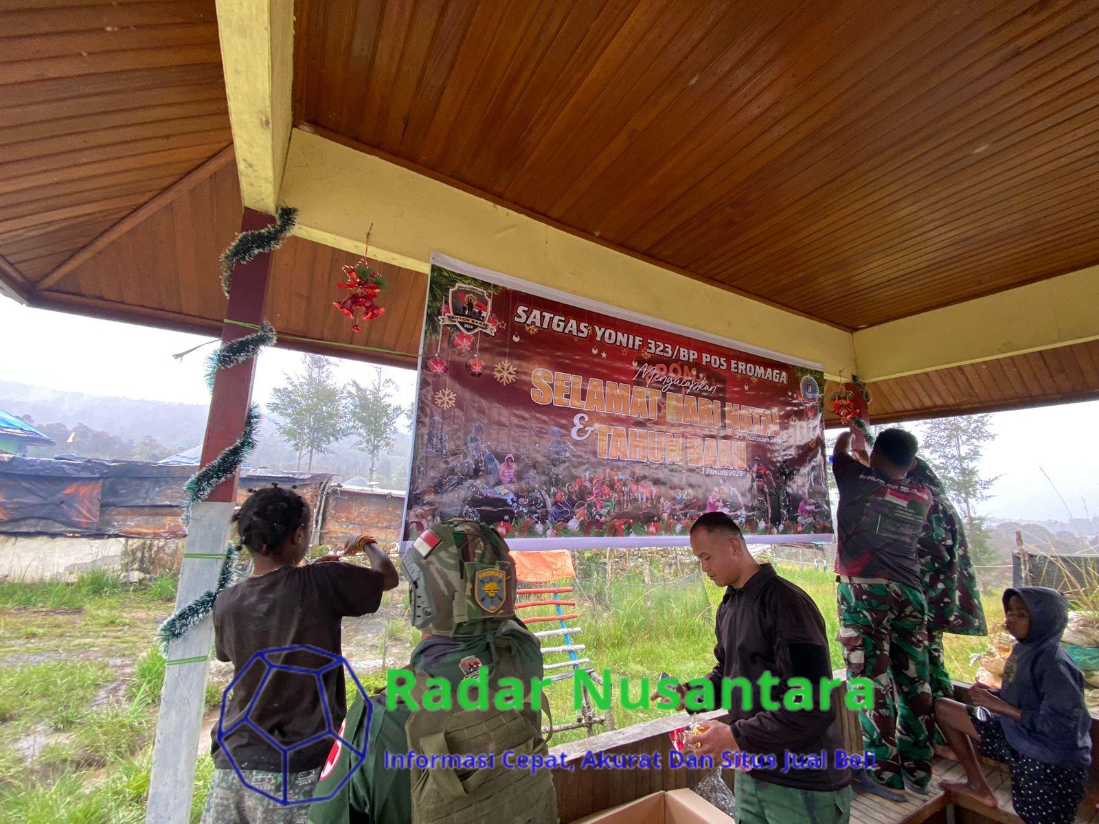 Satgas Yonif 323 Buaya Putih Kostrad Bersama Masyarakat Hias Tempat Ibadah Titik Kuat Eromaga Sambut Natal