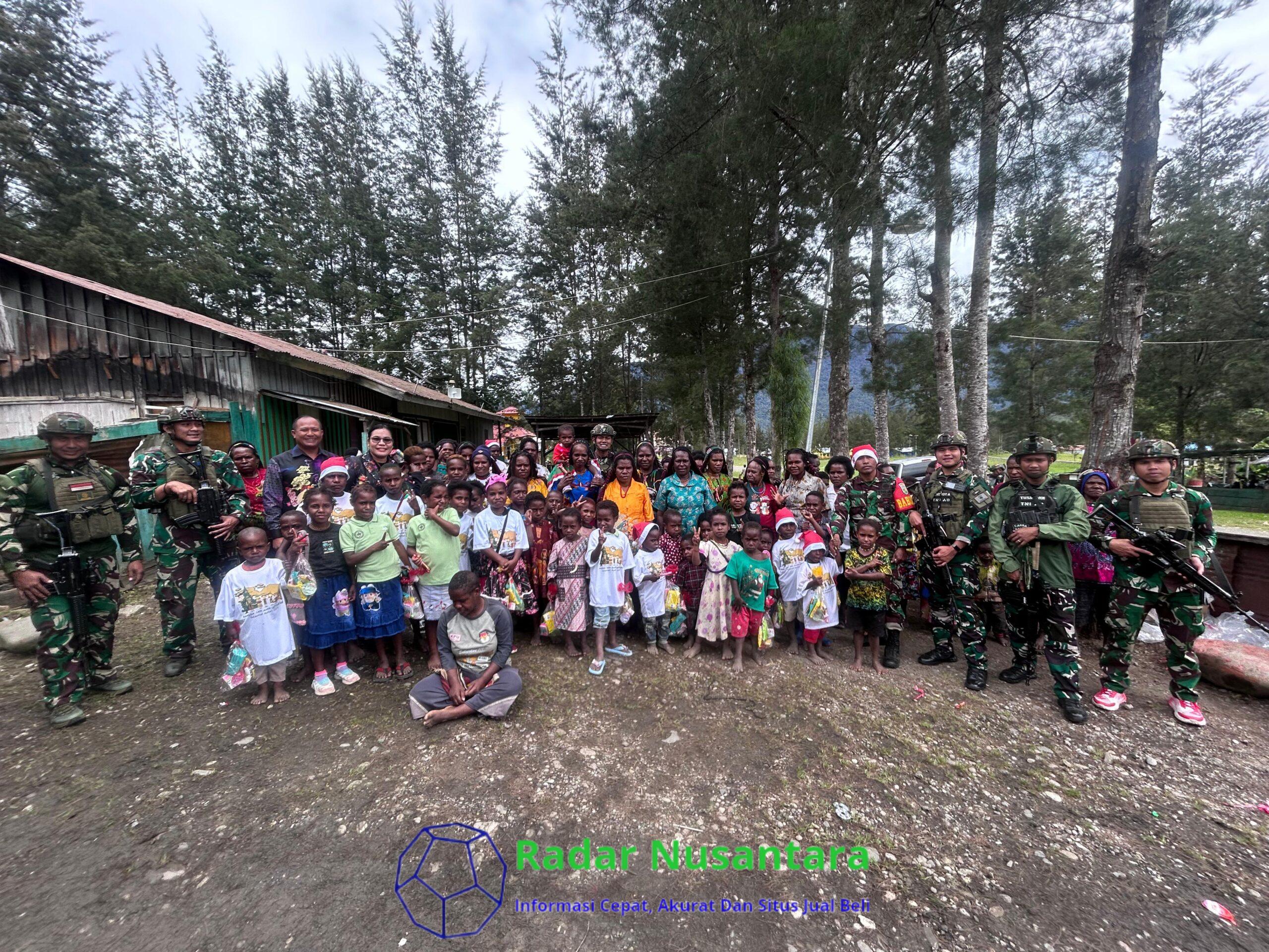 Satgas Yonif 323/BP berbagi kasih Natal di Gereja Eklesia Kampung Kago
