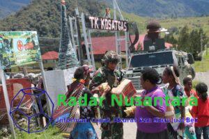 Prajurit Yonif 323 Buaya Putih Kostrad Berbagi Kebaikan di Tanah Papua