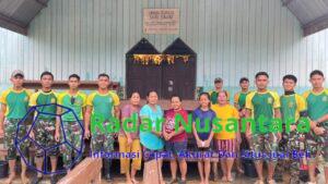 Satgas Pamtas Yonarmed 11 Kostrad Laksanakan Karya Bakti di Desa Tau Lumbis Pasca Banjir Bandang
