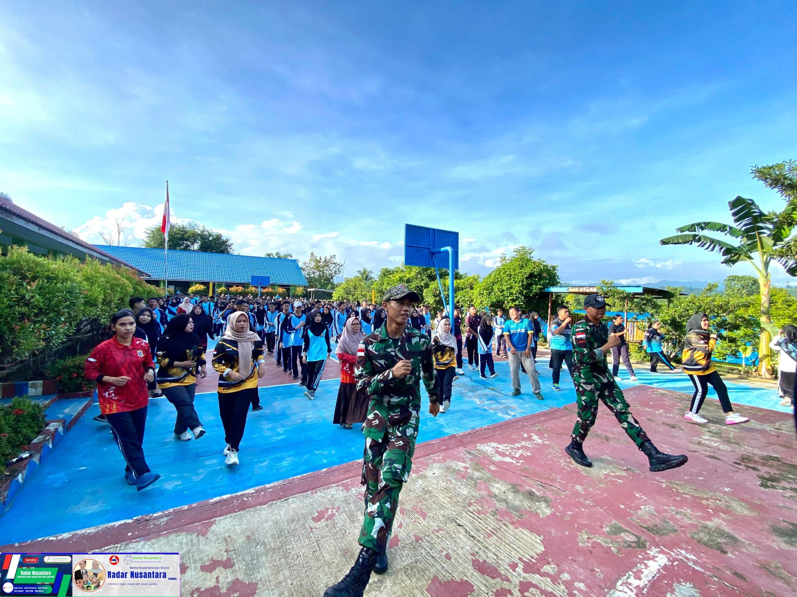 Tingkatkan Kebugaran dan Kebersamaan, Satgas Pamtas Yonarmed 11 Kostrad Melaksanakan Senam Bersama di SMAN 1 Sebatik Tengah