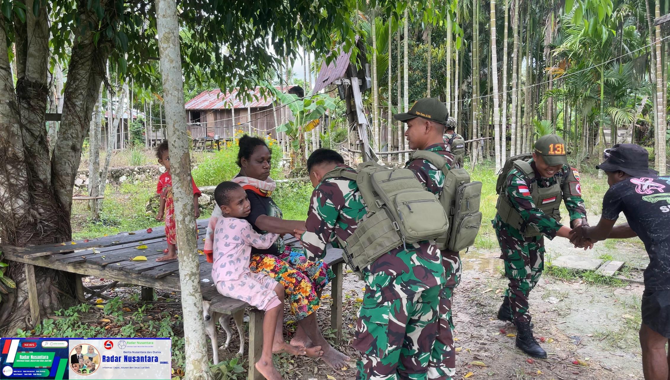 Satgas Yonif 131/Brajasakti Bantu Warga Kampung Waris dengan Pelayanan Kesehatan, Bukti Nyata Cinta Tanah Air