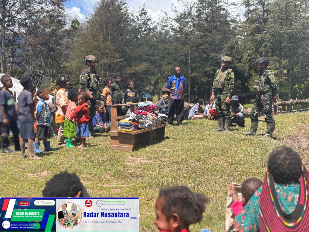 Satgas TNI Berbagi Kasih di Papua: Seragam Hijau TNI Menghangatkan Hati Warga Wuloni