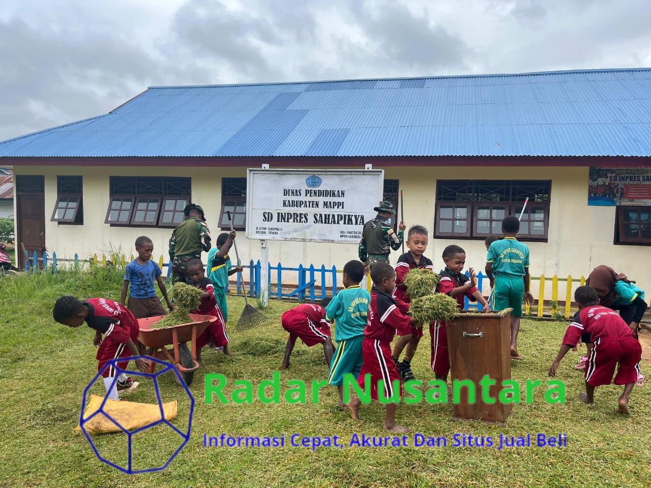 Pos Venaha Satgas Yonif 123/Rajawali Gelar Karya Bhakti Bersama Siswa di SD Inpres Sahapikya